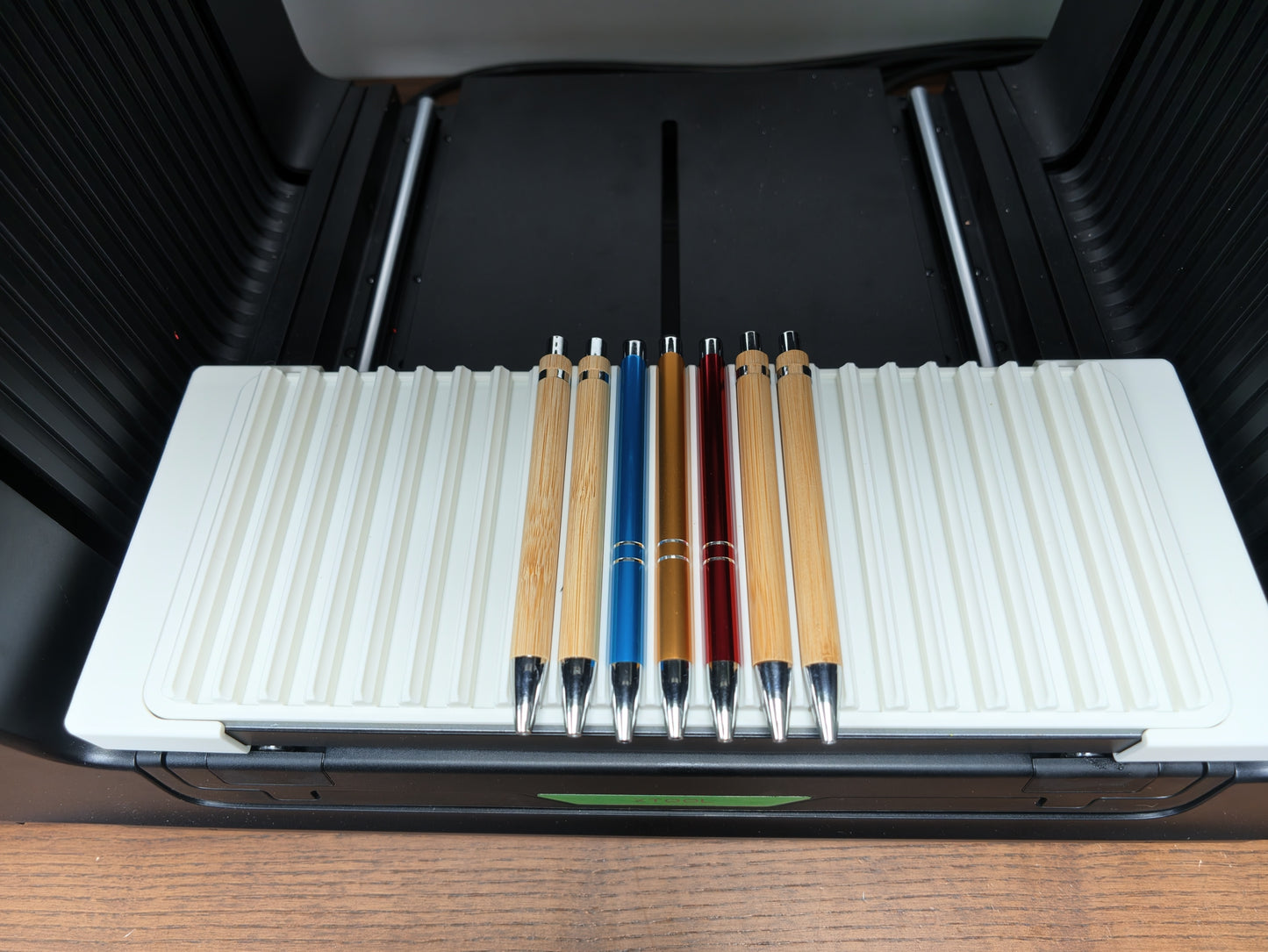 Close up of pen slots on the L3D pen jig for the xTool O1 Omni