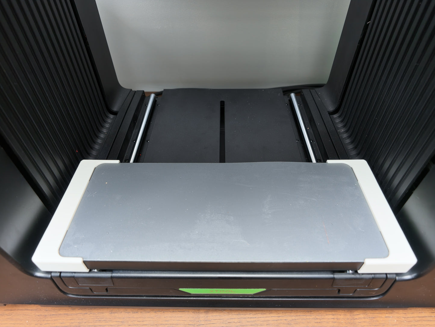Omni Bracket System with an L3D drop-in jig located on the xTool O1 Omni bed