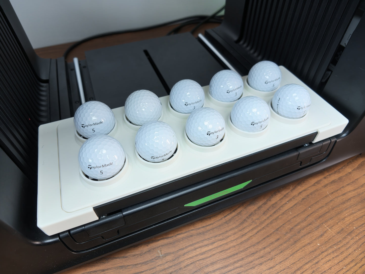 Close-up of golf ball jig alignment pockets for the xTool O1 Omni