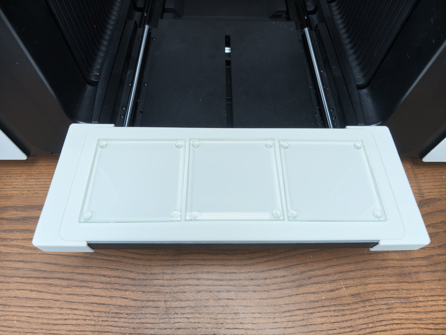 Glass coaster jig alignment detail on the xTool O1 Omni UV printer