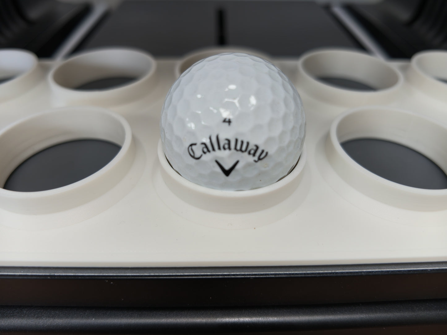 Golf ball jig installed in the Omni Bracket System on an xTool O1 Omni