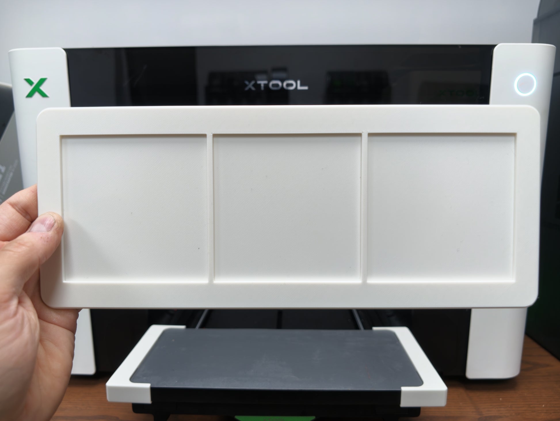 Matte white PLA glass coaster jig colour matched to the xTool O1 Omni