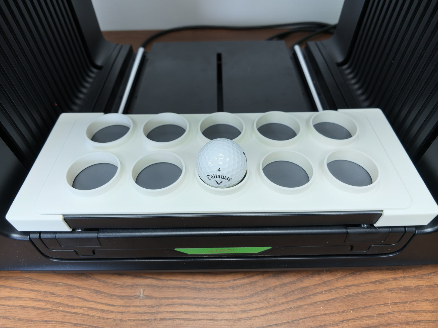UV printed golf balls in the L3D jig on the xTool O1 Omni