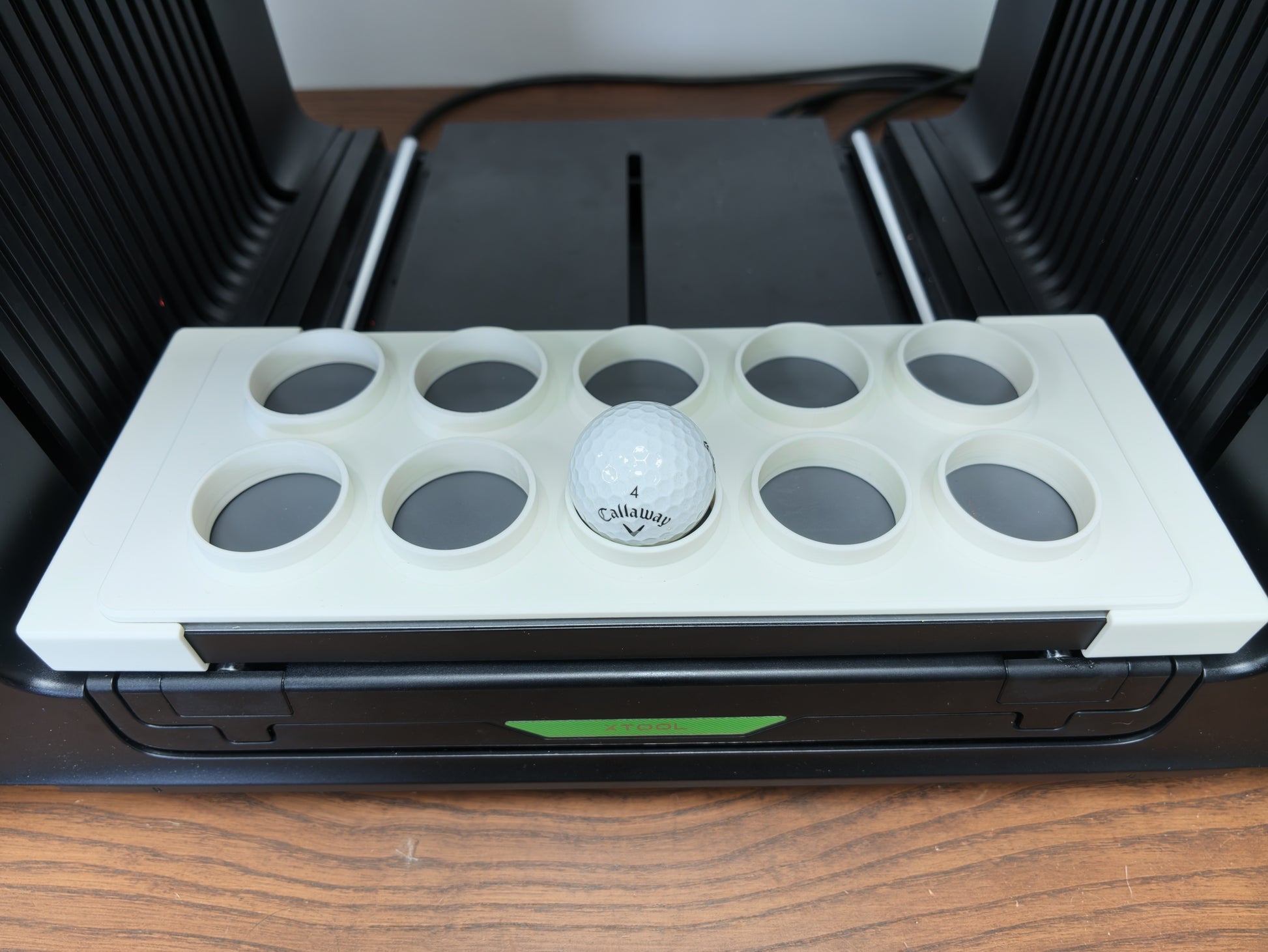 UV printed golf balls in the L3D jig on the xTool O1 Omni