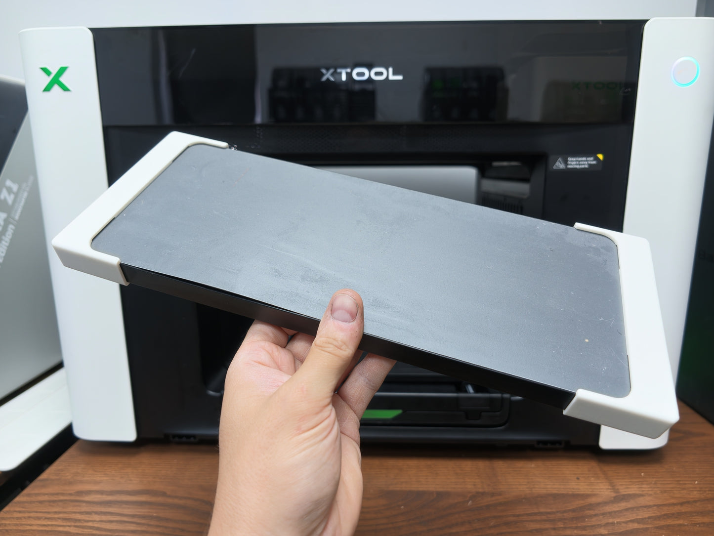 Omni Bracket System holding a batch printing jig in position on the xTool O1 Omni