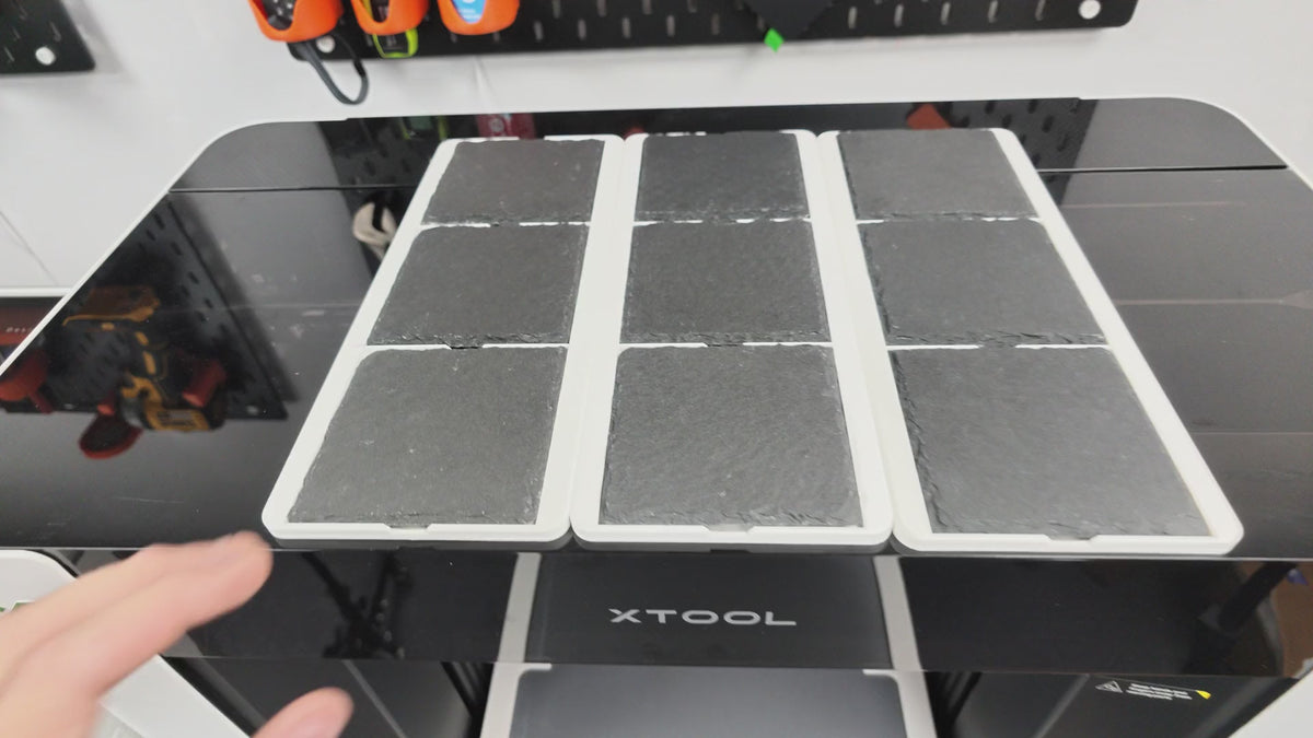 Video loading three L3D slate coaster jigs into the Omni Bracket System XL on the xTool O1 Omni