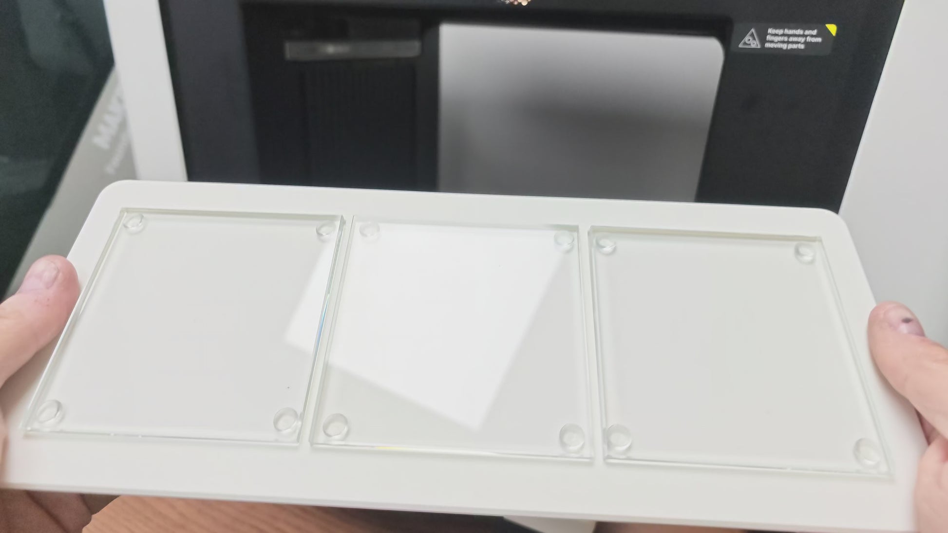 Video of the glass coaster jig batch printing on the xTool O1 Omni UV printer