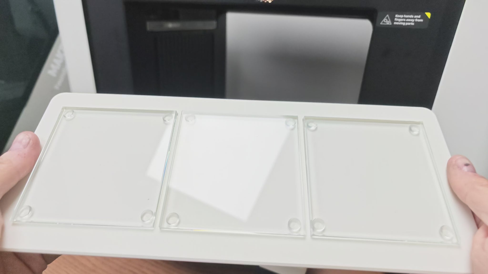 Video of the glass coaster jig batch printing on the xTool O1 Omni UV printer