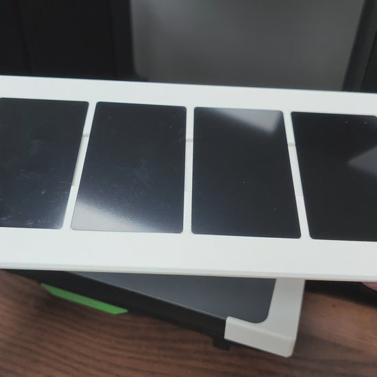 Video of the metal business card jig batch printing on the xTool O1 Omni UV printer
