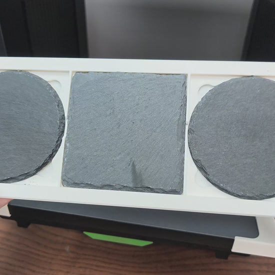 Video of the slate coaster jig in use on the xTool O1 Omni UV printer