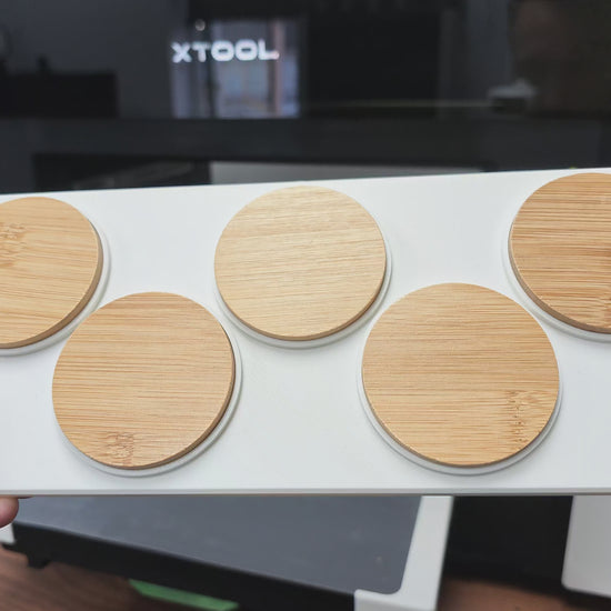 Round Wooden Bottle Opener Jig in use on the xTool O1 Omni